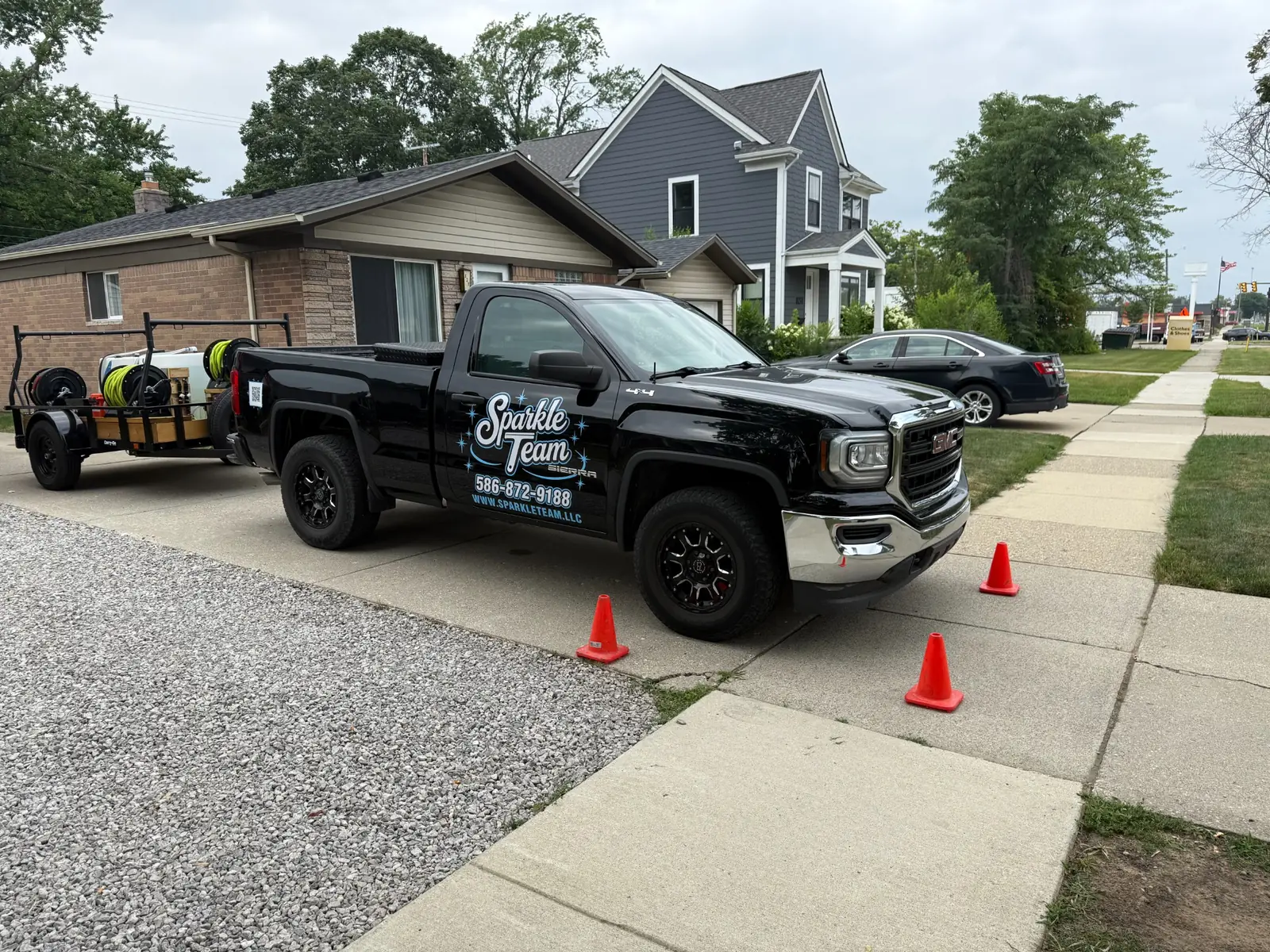 Sparkle Team LLC branded service truck and professional pressure-washing equipment in Royal Oak